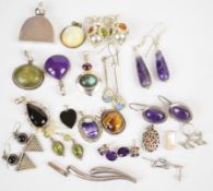 Eight pairs of silver earrings including amethyst, peridot, etc (48g) and fourteen silver pendants