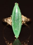 A 14k gold ring set with a marquise cut nephrite jade cabochon, 2g, size O