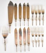 Set of eight Edward VII hallmarked silver fish fork tines and fish knife blades together with