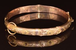 Edwardian 9ct gold buckle bangle with engraved ivy decoration, 7.3g, 5.3 x 5.6cm
