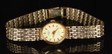 Rotary 9ct gold ladies wristwatch with gold hands and hour markers, champagne dial and quartz