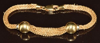An 18k gold bracelet with sphere decoration, 12.8g, 19cm