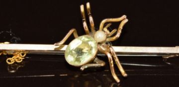 Edwardian 9ct gold brooch in the form of a spider set with peridot and a seed pearl, 3.3g, 5cm