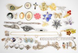 A collection of jewellery, some silver items including charm bracelet, charms including swan,