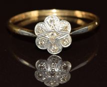 An 18ct gold ring set with diamonds in a platinum setting, 1.9g, size T