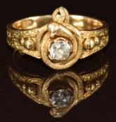 A c1900 18ct gold ring set with an old cut diamond of approximately 0.25ct with a textured serpent