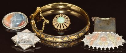 Three c1900 silver brooches, one with applied gold bird decoration (Birmingham 1891), a silver