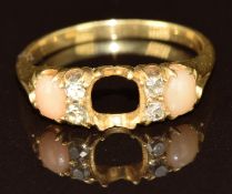 A c1900 18ct gold ring set with coral and diamonds (one stone missing), 2.8g, size N