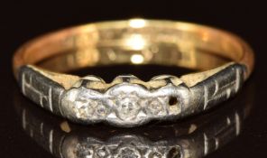 An 18ct gold ring set with two diamonds (one missing), 2.1g, size N