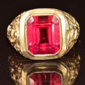 A 9ct gold ring set with a synthetic ruby, 8g, size R