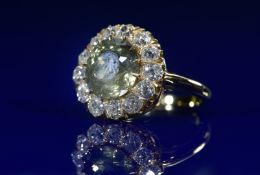 French Belle Époque 18ct gold ring set with a green-yellow colour change sapphire of approximately