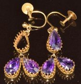 Edwardian pair of 9ct gold earrings set with pear cut amethysts (one missing), 4.8g
