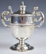 Victorian or Edward VII hallmarked silver table lighter of twin handled urn shape with two removable