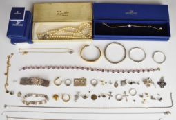 A collection of jewellery including Swarovski necklace and matching bracelet, silver items including