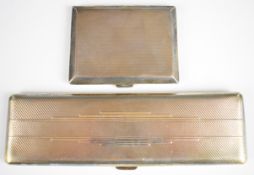 Two Art Deco style hallmarked silver cigarette cases, the longer Birmingham 1935, maker  I S