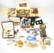 A collection of jewellery including beads, vintage brooches, Ladies Golf Union medallion, Sarah