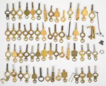 A large collection of pocket watch keys, some named including J Roberts, E Dunningham and A Davis of
