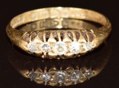 An 18ct gold ring set with five diamonds (Chester 1915, size O), 2.9g, size N/O