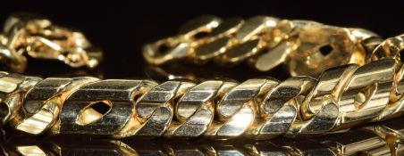 A 14k gold curb link gentleman's bracelet, with original purchase card, 96.3g, 23cm