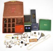 A collection of cufflinks including silver pairs, pair set with amber, pair set with Blue John