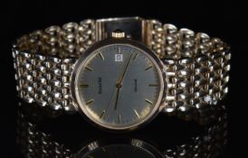 Accurist 9ct gold gentleman's wristwatch with date aperture, gold hands and hour markers,