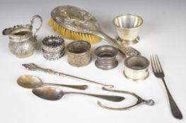 Hallmarked silver items comprising five napkin rings, salt holder, further Art Deco salt or similar,