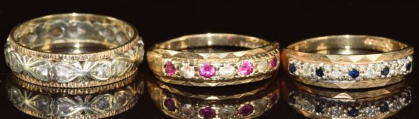 Three 9ct gold rings set with spinel, rubies and spinel and sapphires and diamonds, 7.3g, size O &