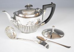 Edward VII hallmarked silver bachelor's teapot, Chester 1903, maker's mark rubbed, length 20cm,