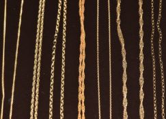 Eight 9ct gold chains, five 9ct gold pendants including garnet, pearl, topaz, quartz and heart