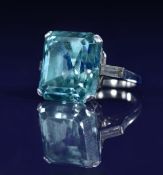 Art Deco platinum ring set with an emerald cut zircon of approximately 22ct and a baguette cut