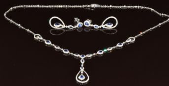 An 18ct white gold necklace set with marquise and pear cut sapphires totalling approximately 2.5ct