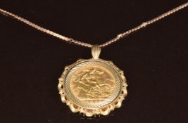 A 9ct gold pendant set with a 1982 gold half sovereign, on 9ct rose gold chain, 8.2g, 42cm