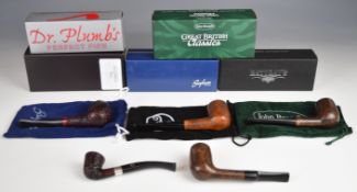 Five boxed smoking pipes comprising Rattray's, Dr Plumb's, John Brumfit, Bringham and GQ Tobaccos,