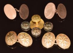 A pair of 15ct gold cufflinks with engraved decoration, Birmingham 1877 with four matching 15ct gold