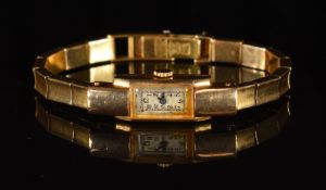 C H Meylan 18ct gold ladies wristwatch with blued hands, black Arabic numerals, silver dial and