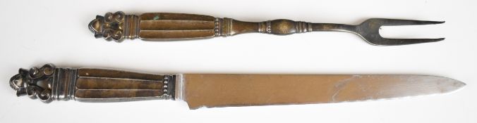 Georg Jensen Danish silver acorn pattern serving fork together with a similar silver handled