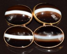 A pair of Victorian cufflinks set with banded agate cabochons, 10.4g