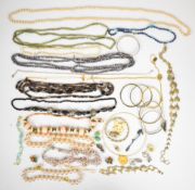 A collection of costume jewellery including pearl necklaces, beaded necklaces, pearl bracelet with