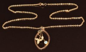 A 9ct gold necklace set with seed pearls and paste, on 9ct gold chain, 5.3g, 42cm, 3.4cm