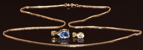A 9ct gold chain and two 9ct gold pendants, one set with a colour change fluorite and zircon and the