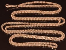 A c1900 9ct rose gold guard chain made up of oval links, 31.3g, 142cm