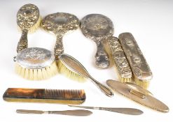 Hallmarked silver mounted dressing table items comprising two hand mirrors, four brushes, comb, nail