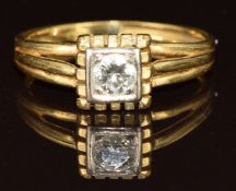 An 18k gold ring set with a diamond of approximately 0.2ct, size J