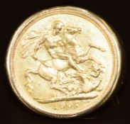A 9ct gold ring set with a 1907 gold full sovereign, 18g, size V