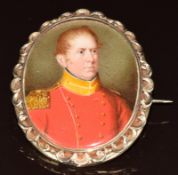 Victorian mourning brooch / pendant set with an ivory portrait miniature of an officer in scarlet