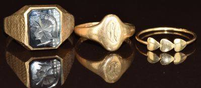 A 9ct gold signet ring set with hematite, 9ct gold signet ring (6.8g, size X & N) and an 18ct gold
