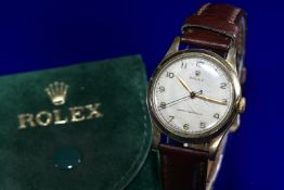 Rolex 9ct gold gentleman's wristwatch ref. 12325 with gold hands and Arabic numerals, white dial and