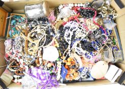 A collection of costume jewellery including silver chain, watches, amber bracelet, loose beads,