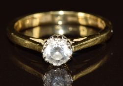 An 18ct gold ring set with a round cut diamond of approximately 0.3ct, 2.6g, size J