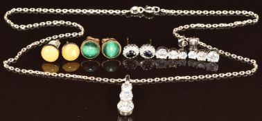 A pair of 9ct gold earrings set with sapphires surrounded by diamonds, a pair of 9ct gold earrings